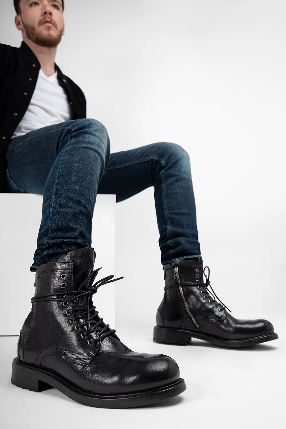 CURZON jet-black military boots.