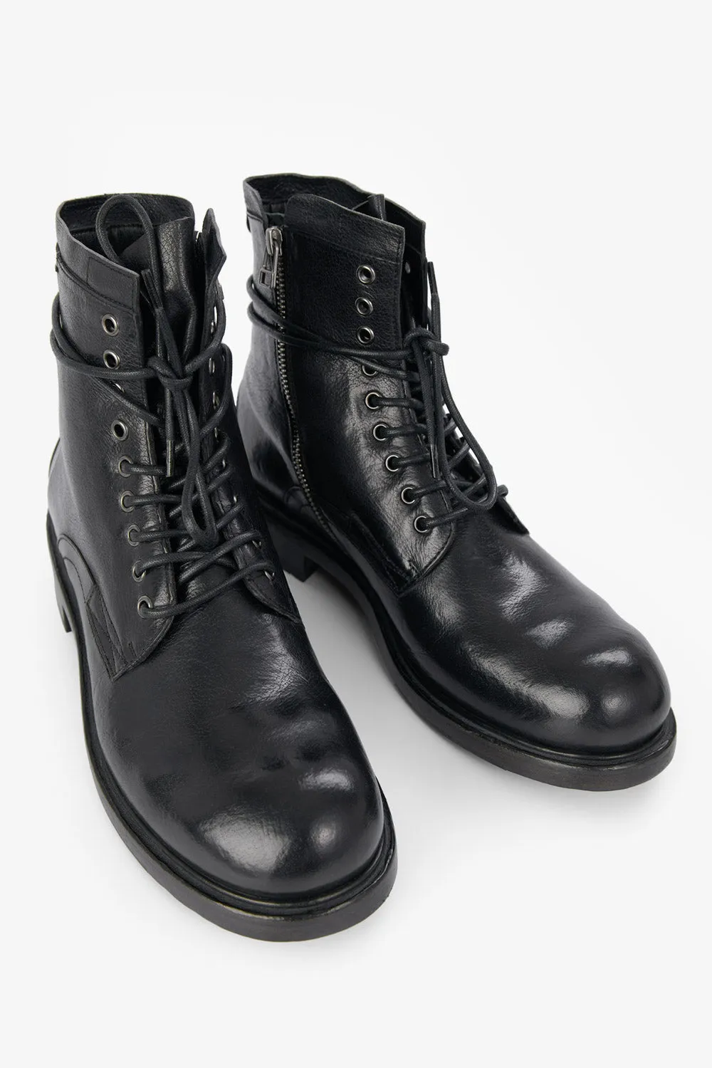 CURZON jet-black military boots.