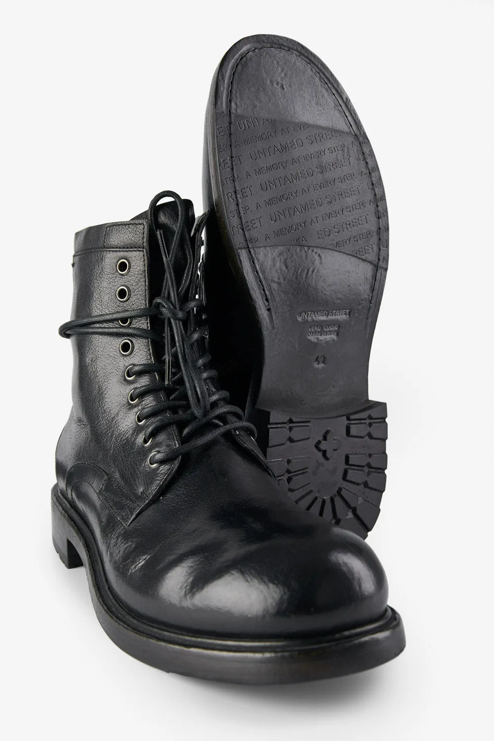 CURZON jet-black military boots.